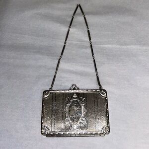 Antique coin holder mirrored powder compact